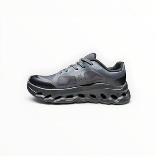 FWSports Shoes On Cloudtilt Remix women's running sneaker in blackout and charcoal with layered x-ray mesh upper.