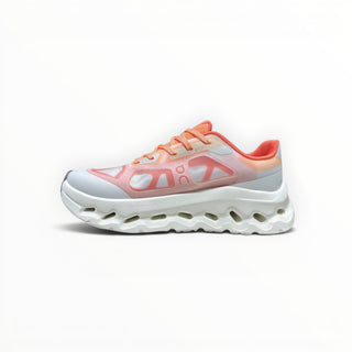 FWSports Shoes On Cloudtilt Remix women's running sneaker in coral, peach, and white with layered x-ray mesh upper.