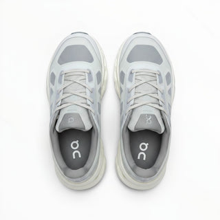 FWSports Shoes On Cloudtilt Remix women's running sneakers in glacier and white with layered x-ray mesh upper.