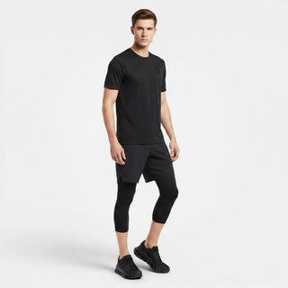 FWSports Shoes model wearing black On-Run Cloudtilt sneakers with mesh upper and Helion superfoam for walking comfort