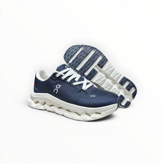 FWSports Shoes Womens On-Run Cloudtilt sneakers in dark blue and white with mesh upper and cushioned rocker sole