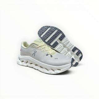 FWSports Shoes Mens On-Run Cloudtilt in light gray and yellow with breathable mesh upper and cushioned rocker sole.
