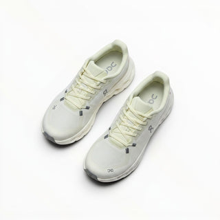 FWSports Shoes Mens On-Run Cloudtilt sneakers in light gray and yellow with breathable mesh and rocker sole design.