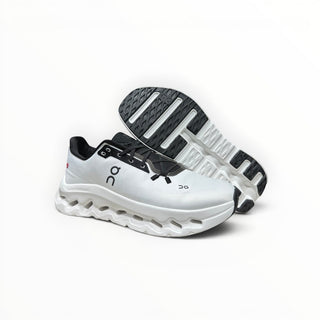 FWSports Shoes Mens On-Run Cloudtilt sneakers in white and black with mesh upper and cushioned Cloudtec sole