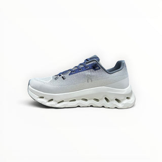 FWSports Shoes Womens On-Run Cloudtilt sneakers in white and dark blue with breathable mesh and rocker sole design.