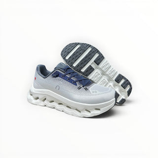 FWSports Shoes On-Run Cloudtilt sneakers in white and dark blue with mesh upper and cushioned rocker sole