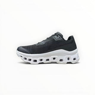 FWSports Shoes On Running Cloudmonster Void women's running shoe in black mesh with a thick white CloudTec sole.