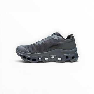 FWSports Shoes Womens On Running Cloudmonster Void running shoe in all-black with breathable mesh and CloudTec sole.
