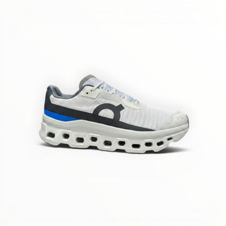 FWSports Shoes On Running Cloudmonster Void sneaker in white and gray with blue accent and thick CloudTec sole.