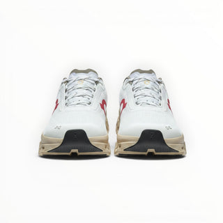 FWSports Shoes On Running Cloudmonster Void sneakers in white and gold with breathable mesh and responsive cushioning.