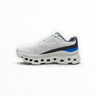 FWSports Shoes Womens On Running Cloudmonster Void in white and gray with blue accent and thick CloudTec sole