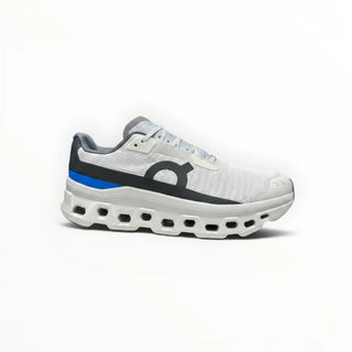 FWSports Shoes Womens On Running Cloudmonster running shoe in white and gray with blue accent and thick CloudTec sole