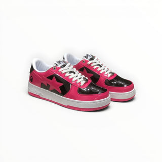 FWSports Shoes BAPE STA low-top sneakers in pink and black patent leather with white laces and rubber soles.