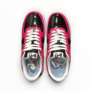 FWSports Shoes BAPE STA low-top sneakers in pink and black patent leather with white laces and cushioned interior.