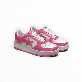 FWSports Shoes BAPE STA low-top sneakers in pink and white patent leather with signature star logo and lace-up design.