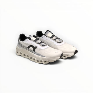 FWSports Shoes white On Cloudmonster women's running shoes with oversized CloudTec cushioning and breathable mesh upper.
