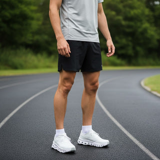 FWSports Shoes On Running Cloudmonster Void white running shoes worn by a man on an outdoor track