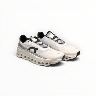 FWSports Shoes white Cloudmonster running shoes with oversized CloudTec cushioning and breathable mesh upper.
