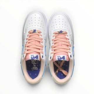 FWSports Shoes BAPE STA low-top sneakers in white and peach with blue accents and lace-up closure