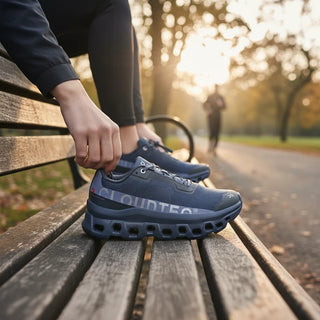 FWSports Shoes Womens On Running Cloudmonster Void blue running shoe with mesh upper and thick CloudTec sole on a bench