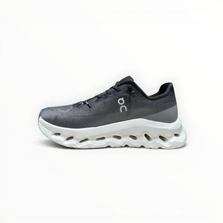 FWSports Shoes Womens On-Run Cloudtilt sneaker in black, gray, and white with a thick white rocker sole.