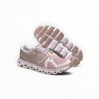 FWSports Shoes Womens On Cloud 6 Waterproof sneakers in purple with a two-tone mesh upper and durable rubber lug outsole.