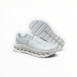 FWSports Shoes Womens On-Run Cloudtilt sneakers in all white with mesh upper, rocker sole, and Cloudtec technology.